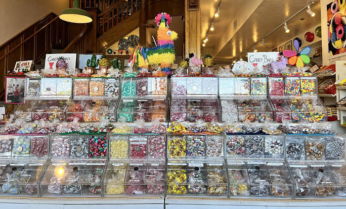 Lots of bins of various candies